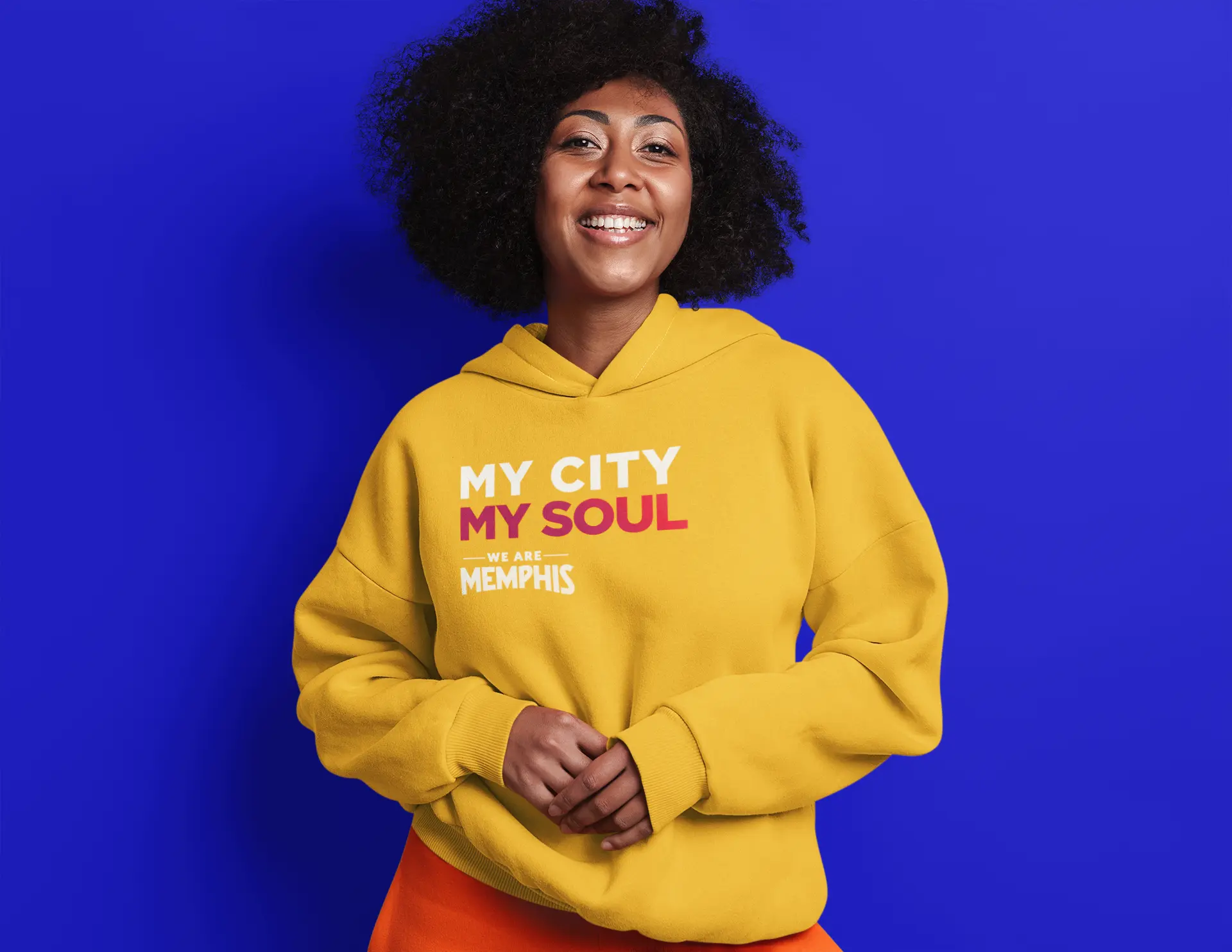 A Memphis resident wearing the "My City My Soul" yellow hooded sweater